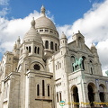 The equestrian statues of King Saint-Louis and Joan of Arc on top of the portico